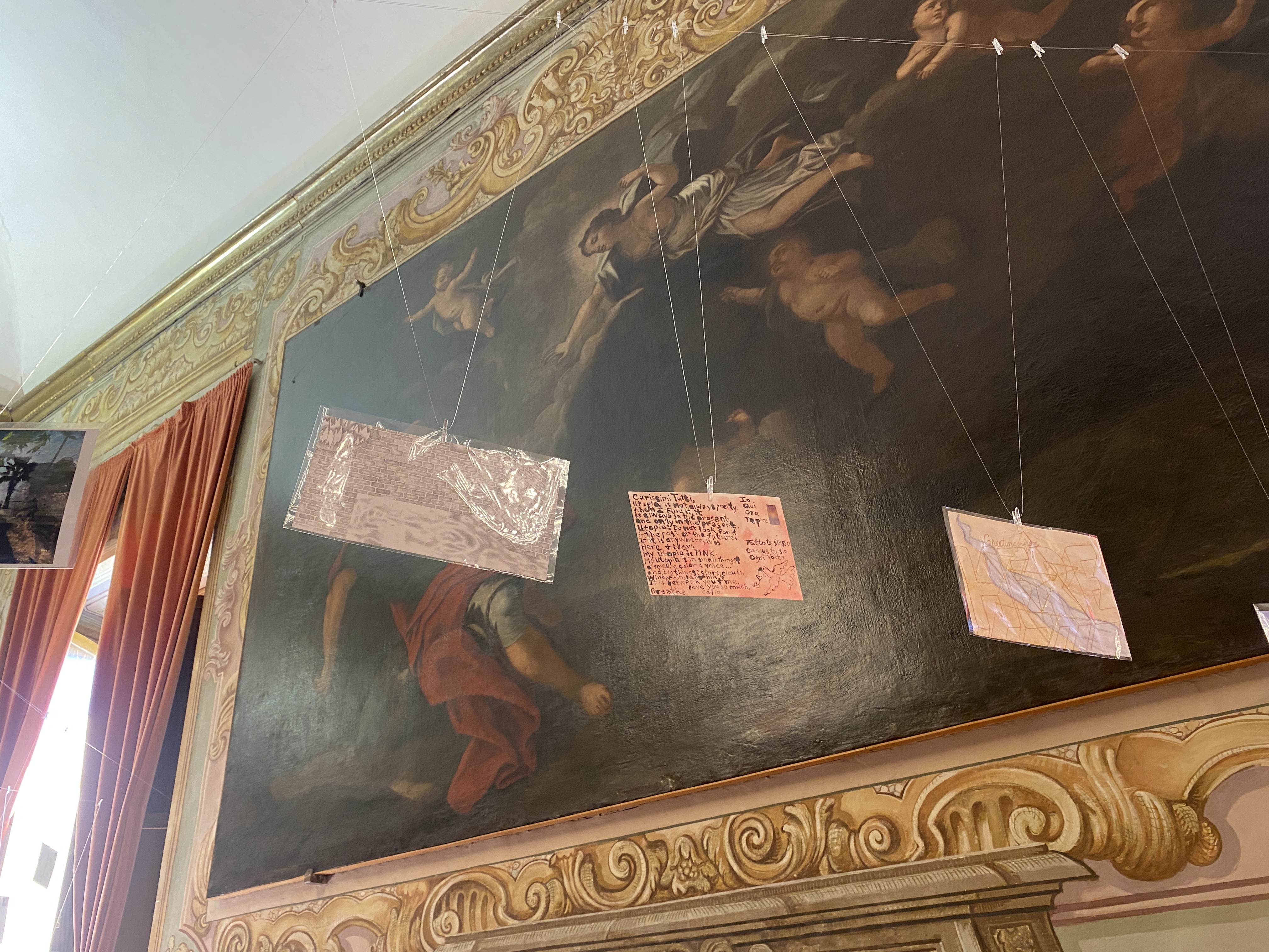 Postcards hanging in the Palazzo Gallio